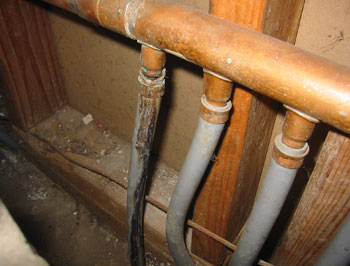 Hot water heating piping leakage