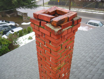 Deteriorated masonry chimney